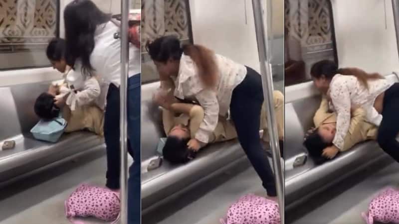 Delhi Metro Viral Video: दिल्ली मेट्रो में दो महिलाओं के बीच मारपीट का वीडियो वायरल, सीट को लेकर भड़का विवाद