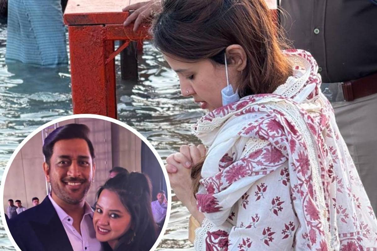 सफेद सूट, मुंह पर मास्‍क...हर की पौड़ी पर धोनी की वाइफ साक्षी का पवित्र स्‍नान