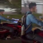बाइक के फ्यूल टैंक पर लैपटॉप रखकर चला रहा था युवक, वीडियो देख लोग हुए हैरान